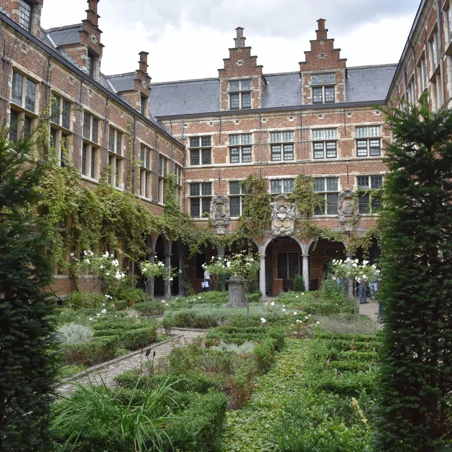 The interior courtyard garden at the Plantin-Moretus Museum is one of the best things to see in Antwerp.