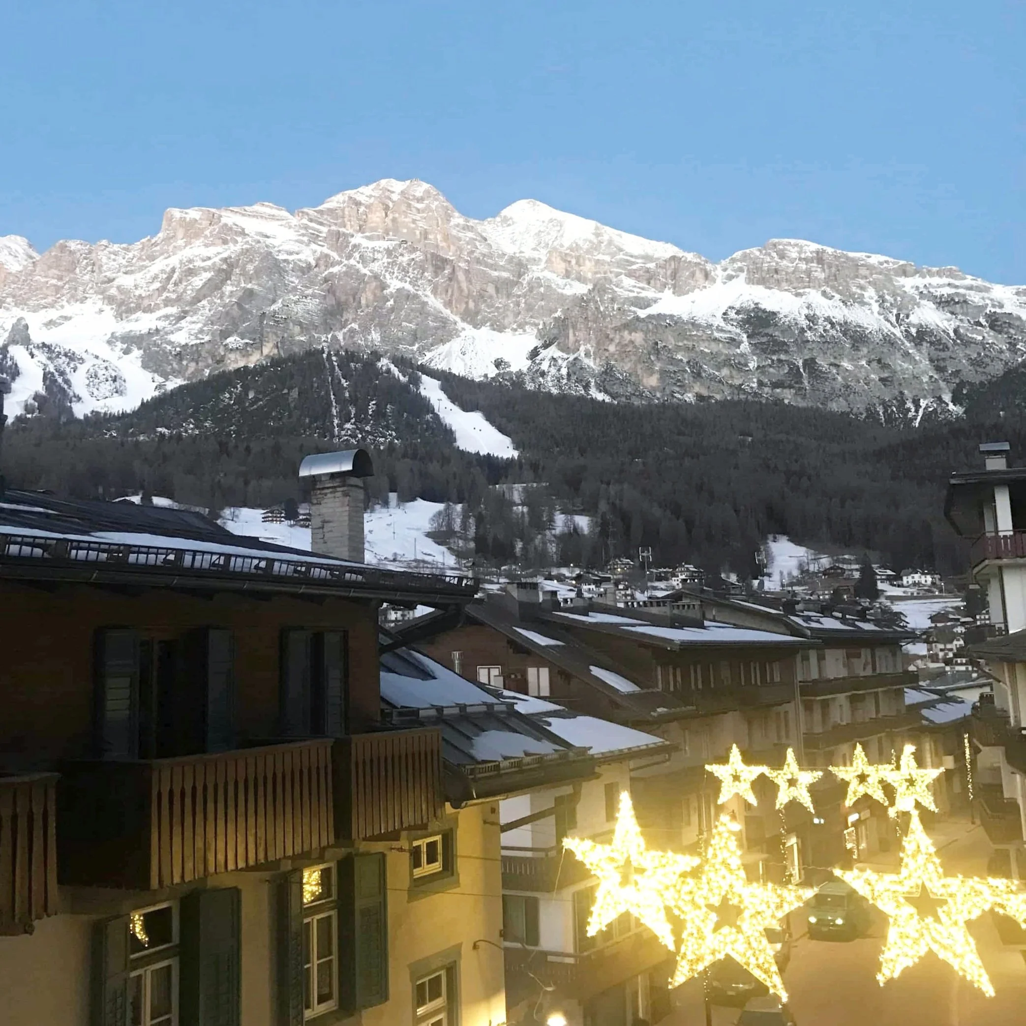 A view of Cortina d'Ampezzo at dusk.