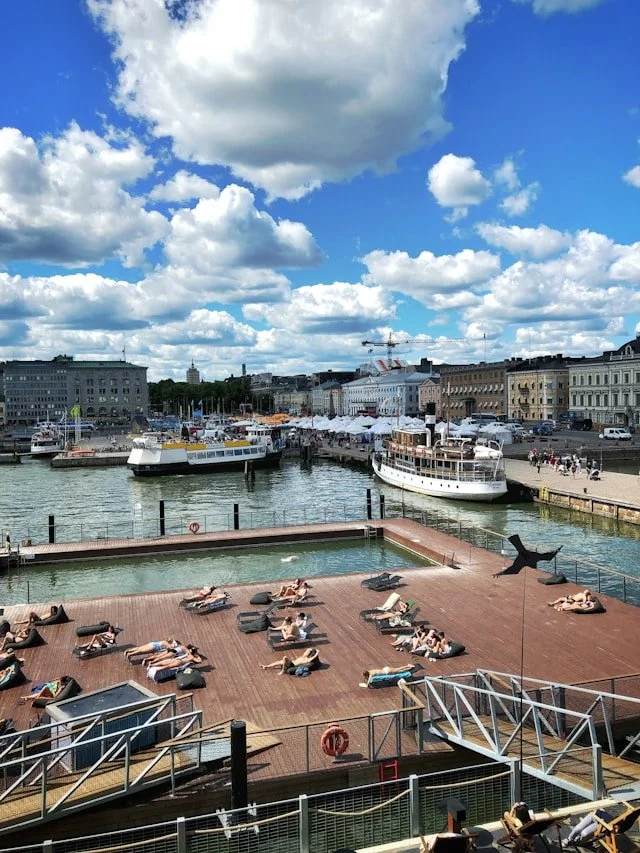 Helsinki harbour, with boats and a pool club.