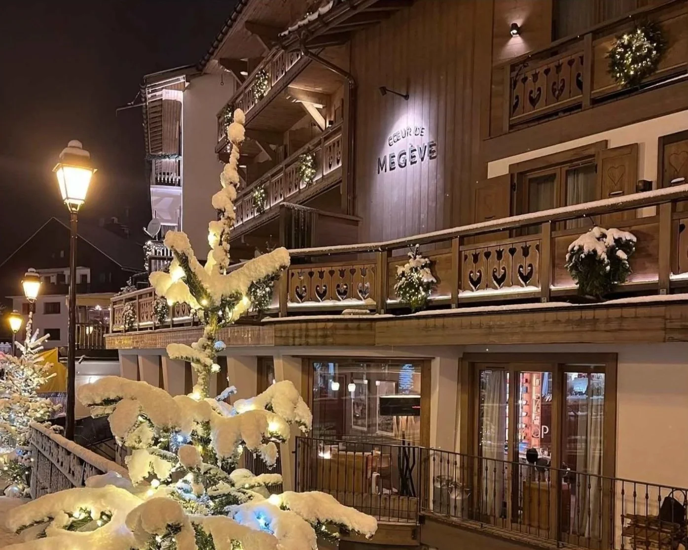 A snow covered hotel in Megève, France.