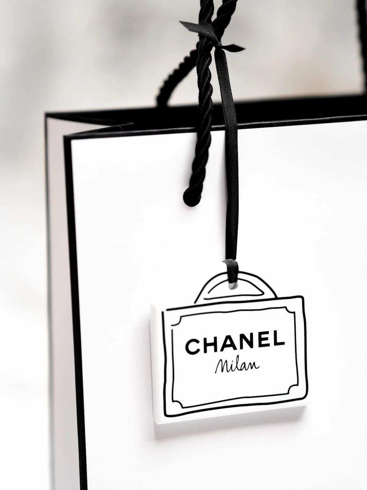 A shopping bag from the Chanel boutique in Milan.