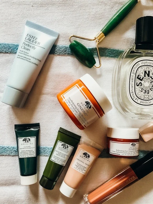 An assortment of travel sized beauty products.