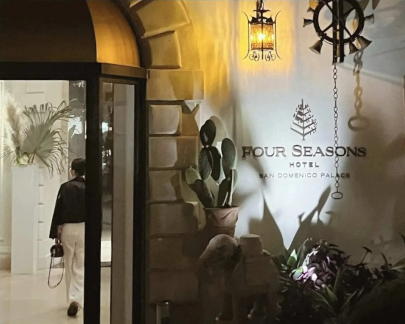 The author entering a Four Seasons Hotel.