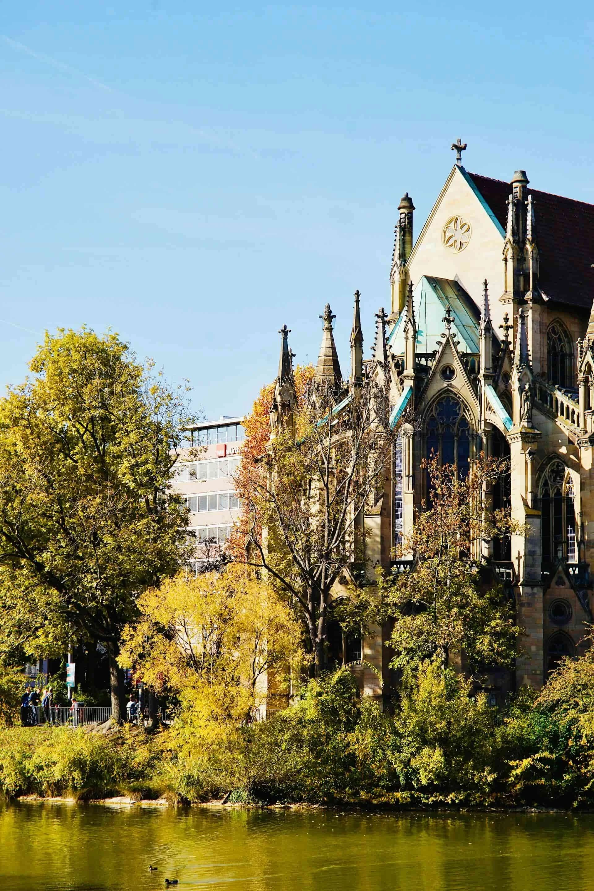 The Feuersee in Stuttgart, Germany, a small lake and park that surrounds a gothic church.